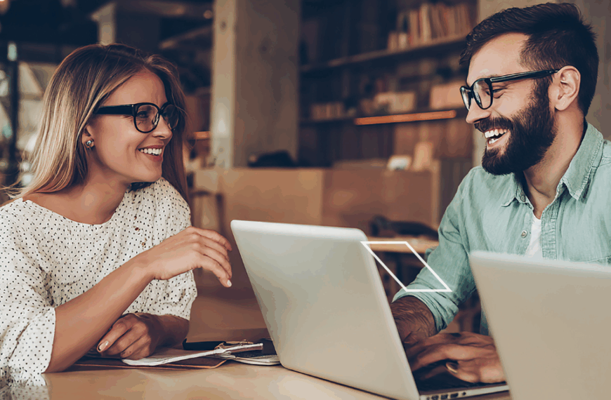 where is domain co. two people working in the office